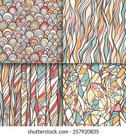Hand drawn abstract geometric doodle seamless patterns set. Colorful vintage textures. Vector illustration