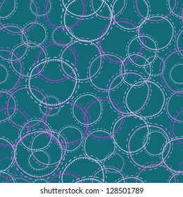 Hand drawn abstract seamless pattern with circles in  blue and pink tones