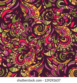 Hand drawn abstract seamless pattern in motley tones. Endless oriental background with paisley elements