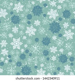 Hand drawn abstract winter snowflakes pattern. Stylish crystal stars on green background. Elegant simple holiday all over print. Festive gift wrapping paper yule illustration. Seamless vector swatch.