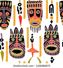 Hand drawn african tribal masks. Seamless pattern on white background. Doodle vector illustration. 