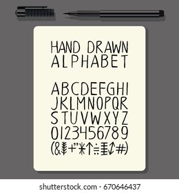 Hand Drawn Alphabet Set. Alphabet on Paper Background with Fine Liner Pen.