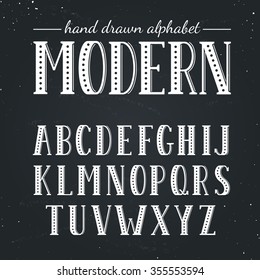 Hand drawn alphabet. Uppercase letters and symbols on chalkboard. Handdrawn typography. Modern font. 