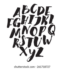 Hand drawn alphabet written with brush pen. V letter is missed here. 