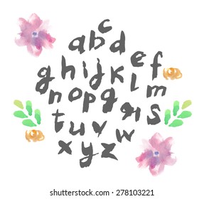 Hand drawn alphabet written with brush pen. Letters are decorated 