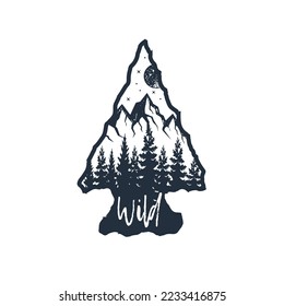 Hand drawn arrowhead textured vector illustration. Double exposure with pine forest, mountain range, night sky, and "Wild" lettering.