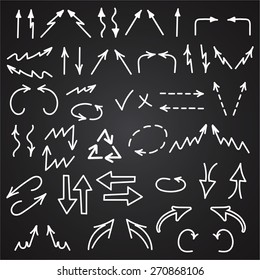 Hand drawn arrows icons set isolated on blackboard background. Business charts, graphs, infographics. Vector illustration