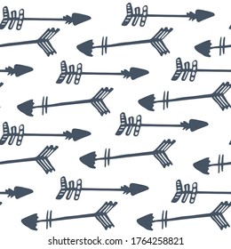 Hand drawn arrows seamless pattern isolated on white background. Tribal endless wallpaper in doodle style. Decorative backdrop for fabric design, textile print, wrapping paper. Vector illustration