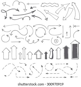 Hand drawn arrows set. Vector illustration. Collection of arrowheads - rough jagged edges.