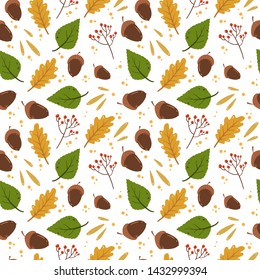Hand drawn autumn seamless pattern. Green and yellow leaves, acorns, berries on a white background. 
