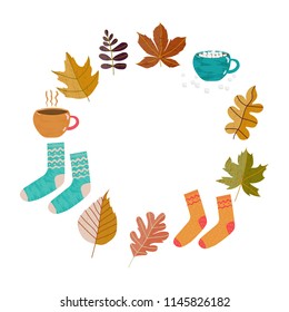 Hand drawn Autumn seasons holiday Hugge doodle icons with leaves, cup of tea, cocoa, chocolate, marshmallow, warm socks isolated on white. Vector illustration for banners, greeting cards, posters