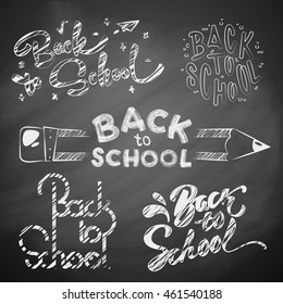 Hand drawn Back to School Calligraphic Designs Label Set. Imitation drawing with chalk on Chalkboard or blackboard.