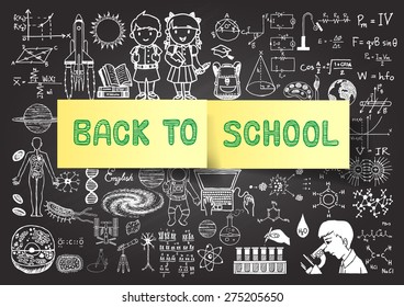 Hand drawn back to school doodles on chalkboard with post it.