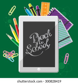 Hand drawn back to school lettering illustration with set of  supplies and computer tablet