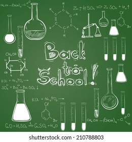 Hand drawn back to school sketched elements on chalkboard background. Notebook doodles with lettering, chemical flasks, formulas.