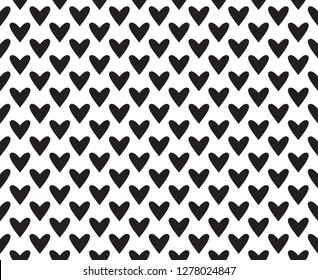 Hand drawn background with hearts. Seamless wallpaper on surface. Chaotic texture with many love signs. Lovely pattern. Line art. Print for banner, flyer or poster. Black and white illustration