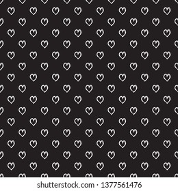 Hand drawn background with hearts. Seamless grungy wallpaper on surface. Abstract texture with many signs. Lovely pattern. Print for design. Black and white illustration