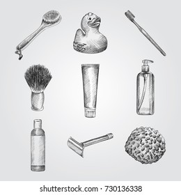 Hand Drawn Bathroom accessories Sketches Set. Collection Of Sponge, Toothbrush, Toothpaste, bath brush, Bathroom Duck, Liquid Soap, Shampoo, Razor, Shaving Brush Sketches isolated on white background