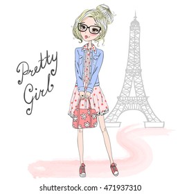 Hand drawn beautiful cute girl with glasses on the background of Eiffel Tower. Vector illustration.