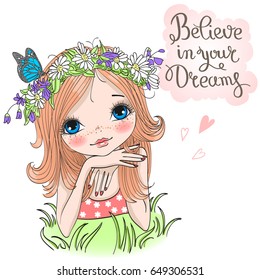 Hand drawn beautiful cute girl in a wreath from daisies with a butterfly lies on a green grass on the background with inscription believe in your dreams. Vector illustration.