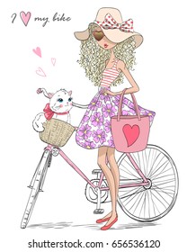 Guapa chica atractiva a mano cerca de la bicicleta con un gatito en la canasta. Ilustración vectorial.