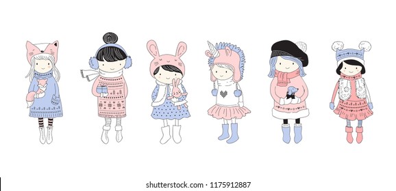 Hand drawn beautiful cute little winter girls collection. Merry Christmas greeting cards vector design