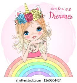 Hand drawn beautiful cute little unicorn girl with rainbow. Vector illustration.