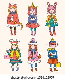 Hand drawn beautiful cute little winter girls set. Merry Christmas greeting cards vector illustration