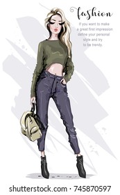 Hand drawn beautiful fashion woman with backpack. Stylish model posing. Blond hair woman in fashion clothes. Stylish outfit. Sketch.