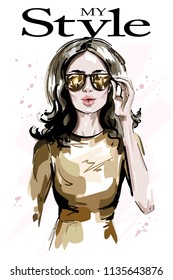 Hand drawn beautiful woman in sunglasses. Fashion woman portrait. Stylish lady. Sketch. Vector illustration.