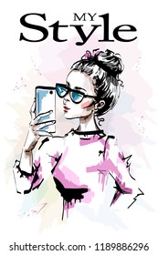 Hand drawn beautiful young with phone in her hand. Stylish elegant girl in sunglasses. Fashion woman making selfie. Sketch.