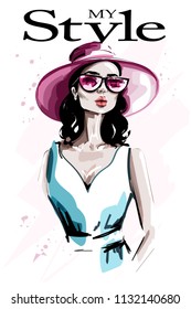 Hand drawn beautiful young woman in hat. Fashion woman in sunglasses. Stylish lady. Sketch.