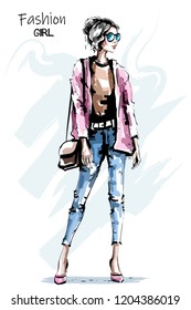 Hand drawn beautiful young woman with bag. Stylish autumn outfit. Fashion woman look. Sketch.