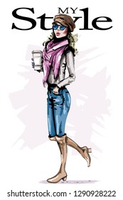 Hand drawn beautiful young woman holding plastic coffee cup. Stylish girl in cap. Fashion woman look. Female character in sunglasses. Sketch.