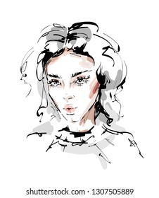 Hand drawn beautiful young woman face. Female face with makeup. Beautiful girl. Sketch. Vector illustration.