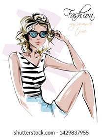 Hand drawn beautiful young woman in sunglasses. Stylish girl in summer clothes. Fashion woman look. Pretty tanned girl in shorts. Sketch. Vector illustration.