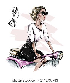 Hand drawn beautiful young woman in sunglasses. Stylish girl sitting on bike. Fashion woman look. Sketch. Vector illustration. 