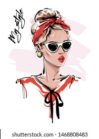 Hand drawn beautiful young woman in sunglasses. Stylish girl with red headband. Fashion woman look. Sketch. Vector illustration.