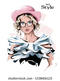 Hand drawn beautiful young woman in pink hat. Stylish girl in eyeglasses. Fashion woman look. Sketch. Vector illustration.