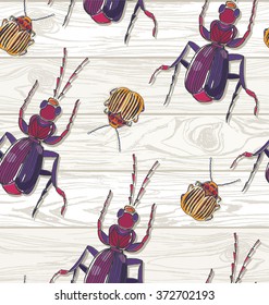 Hand drawn Beetles on wooden background. Seamless pattern. Colorado beetle, ant