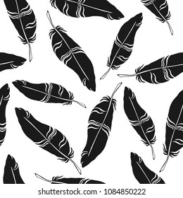 Hand drawn bird feather seamless pattern on white background. Boho style. Design element for wrapping paper, textile, fabric, wallpaper. 