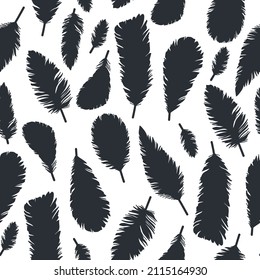Hand drawn bird feathers background, black silhouettes seamless pattern