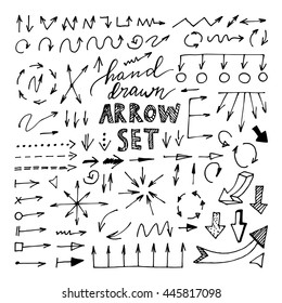Hand drawn black arrows set on white background