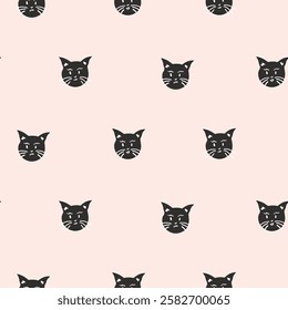 Hand drawn black cat faces arranged to form polka pattern as Halloween spooky scene in color palette of black on a cream background. A seamless vector pattern. Great for home decor, fabric, wallpaper.