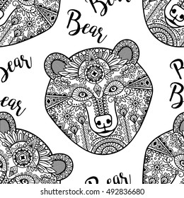 Hand drawn black doodle bear face, seamless pattern. Vector illustration