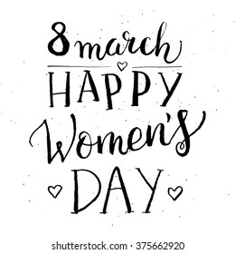 Hand drawn black ink vector isolated  lettering "Women's day" on white background.