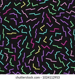 Hand drawn black and white abstract confetti seamless pattern. Pop art fashion festival abstract on black background in memphis style.