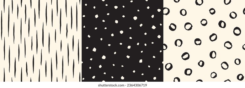 Hand drawn black and white doodle seamless patterns set - circles, rings, fusiform brush drawn strokes, smears, ink lines, stripes, uneven dots, specks, flecks. Chaotic creative artistic backgrounds.
