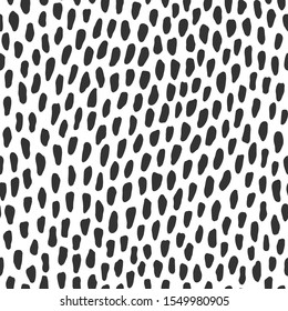 Hand drawn black and white seamless dot pattern. Vector abstract texture with short vertical brushstrokes.