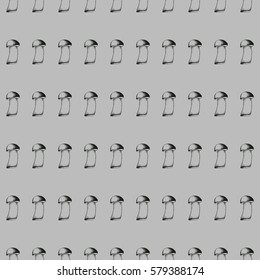 Hand drawn black and white seamless pattern with mushrooms on grey background. Vector doodle monochrome illustration. Boletus